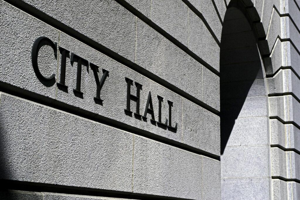Engraved outside of Los Angeles City Hall, where quality local government communication and public participation is essential
