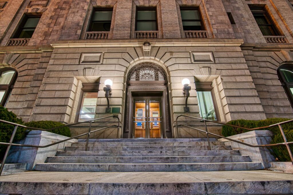 The steep marble steps up to a dimly illuminated city hall, where SmartComment’s transparency improves local government public relations